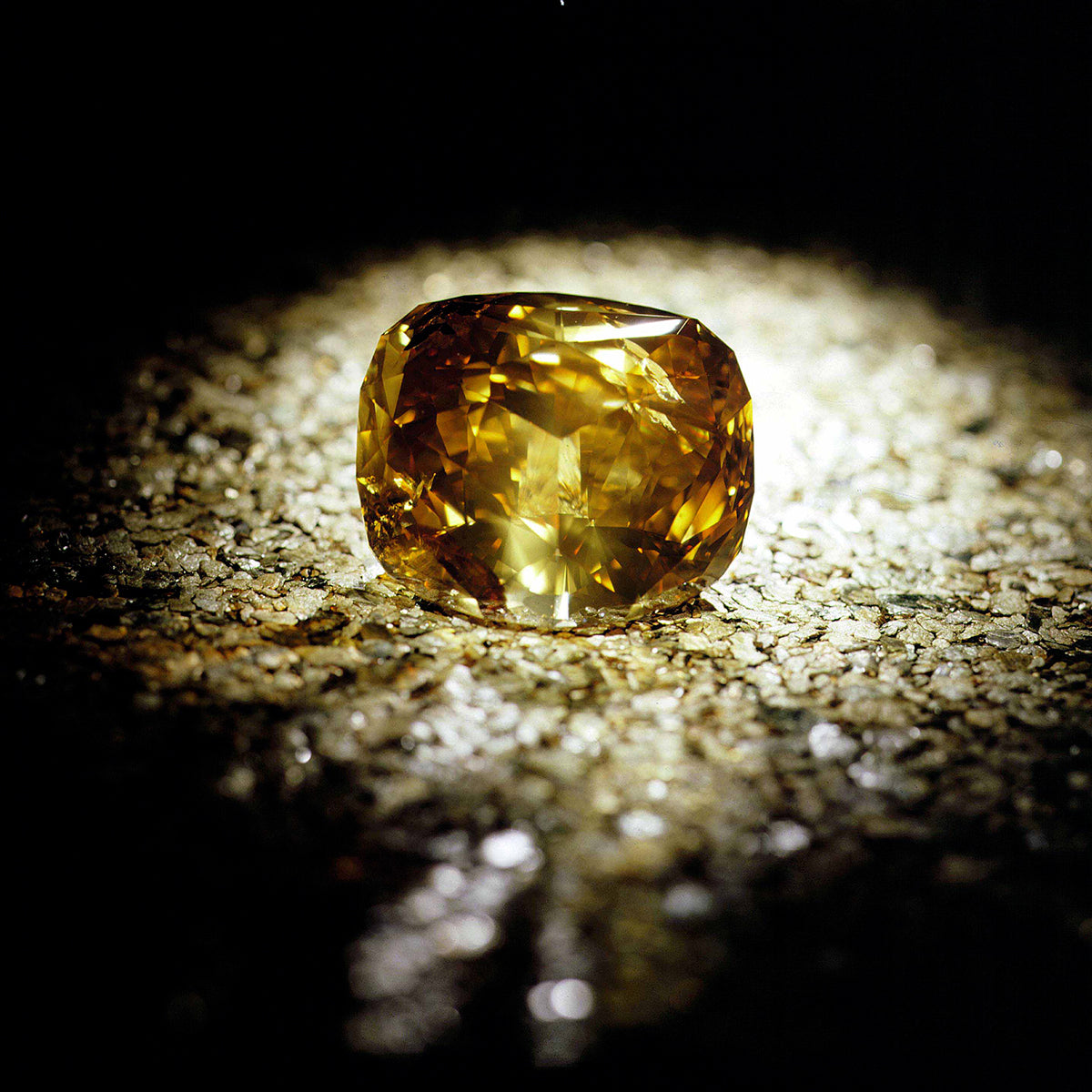 Yellow diamond shining in the light