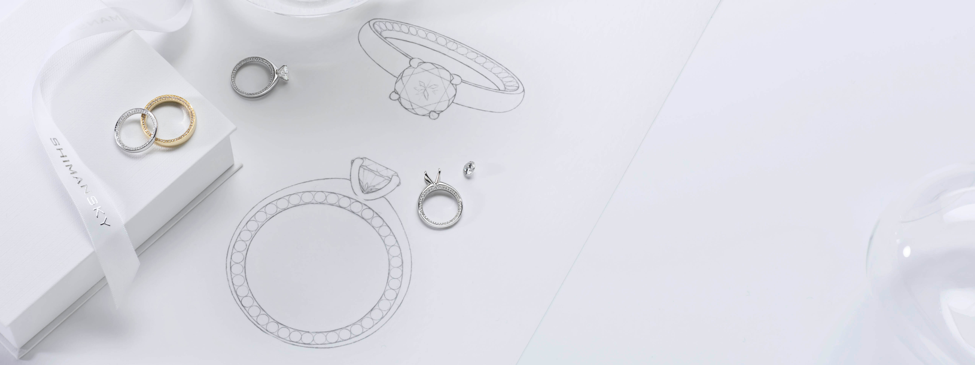 Hand-sketch of the Shimansky ‘Circle of Love’ bespoke engagement ring and matching wedding band, followed by the finished platinum set with round natural diamonds Shimansky Diamonds, Cape Town South Africa.