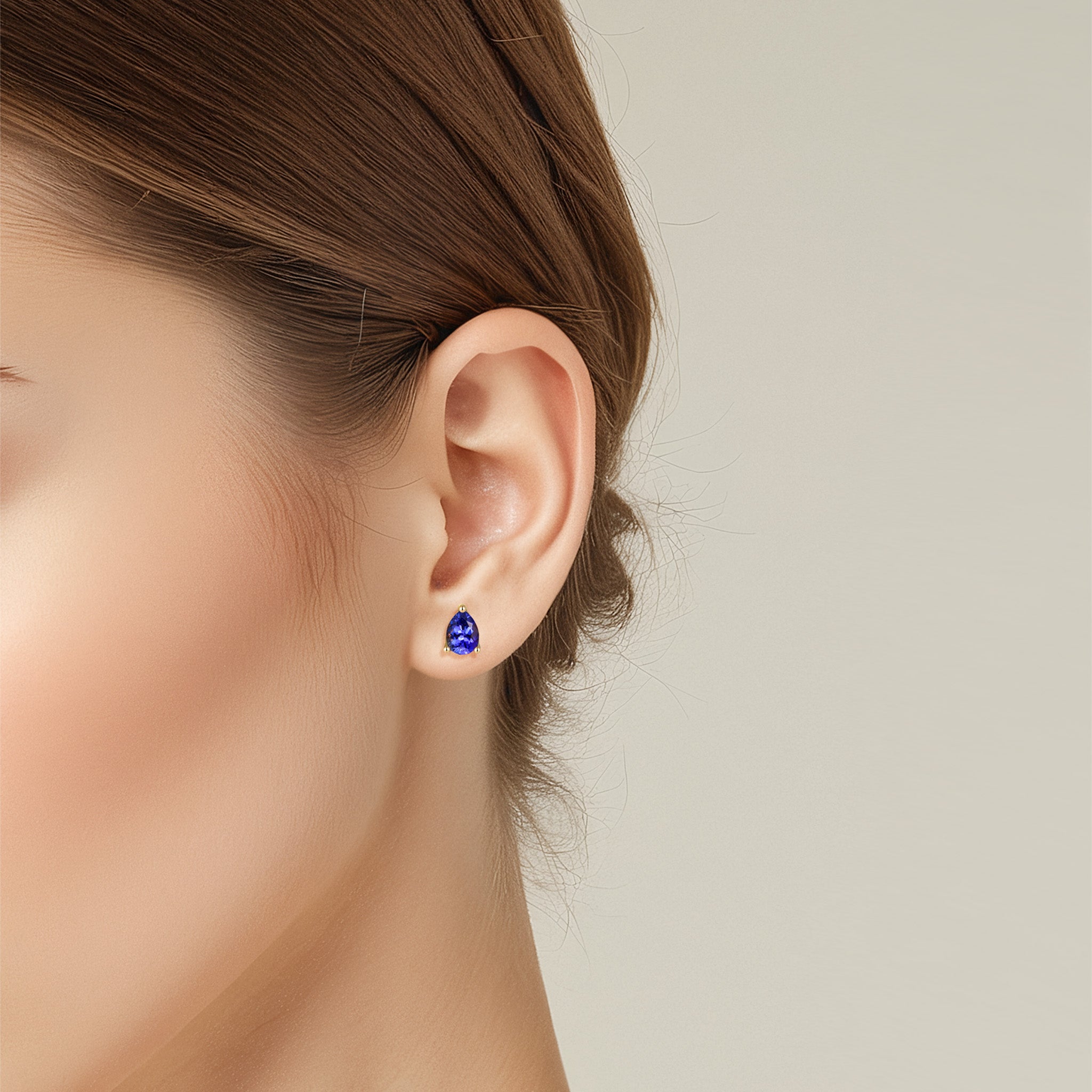 Shimansky 1.2 TCW Pear Tanzanite Solitaire Stud Earrings in 14K Yellow Gold Model View