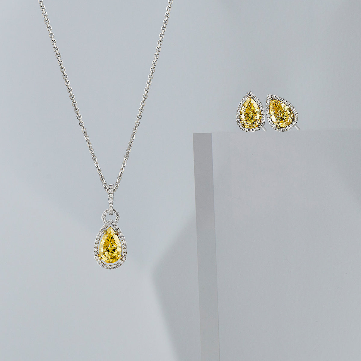 Exquisite yellow diamond necklace and earrings by Shimansky, radiating luxury and elegance in every facet.