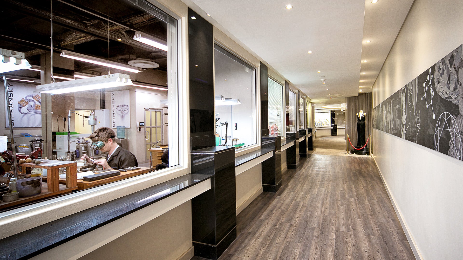 Elegant hallway at the Cape Town Diamond Museum, showcasing a large window and a refined table, radiating opulence.