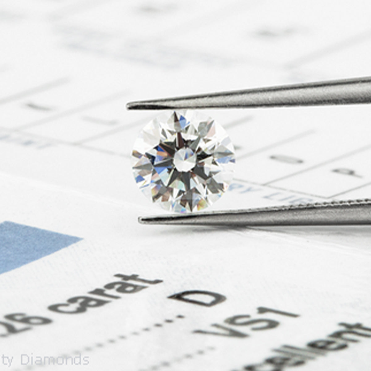 A brilliant diamond grasped by tweezers, showcasing its exquisite facets.