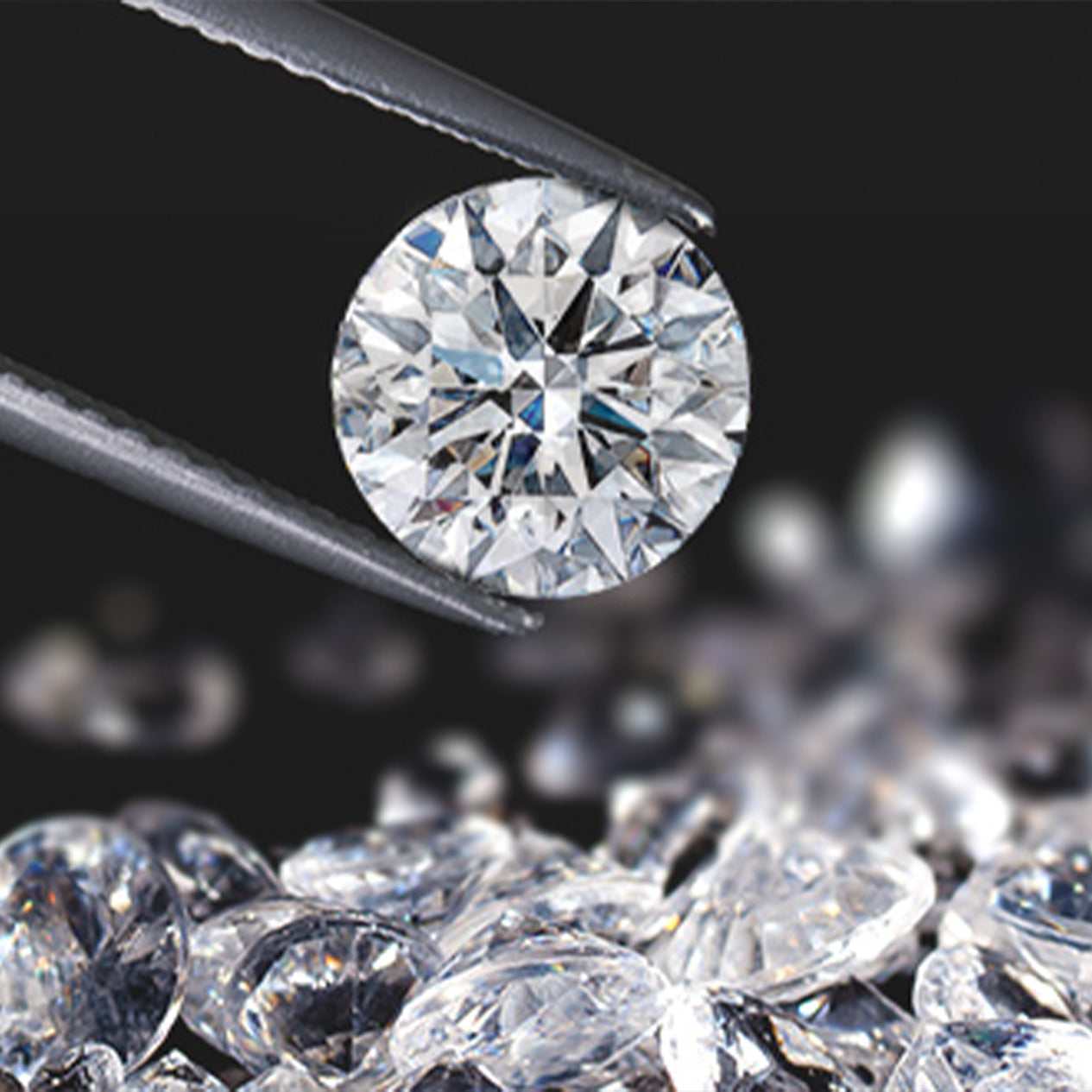 A Shimansky diamond delicately held by tweezers, revealing its facets, showcasing exquisite craftsmanship