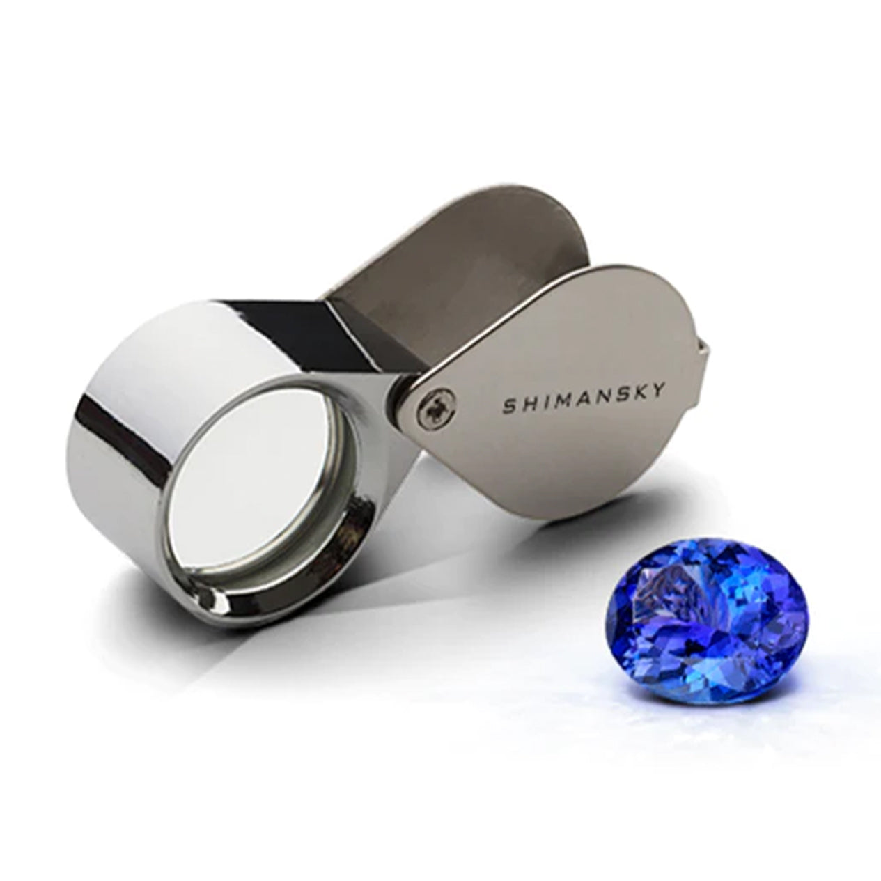 Shimansky Tanzanite gem with an inspection tool