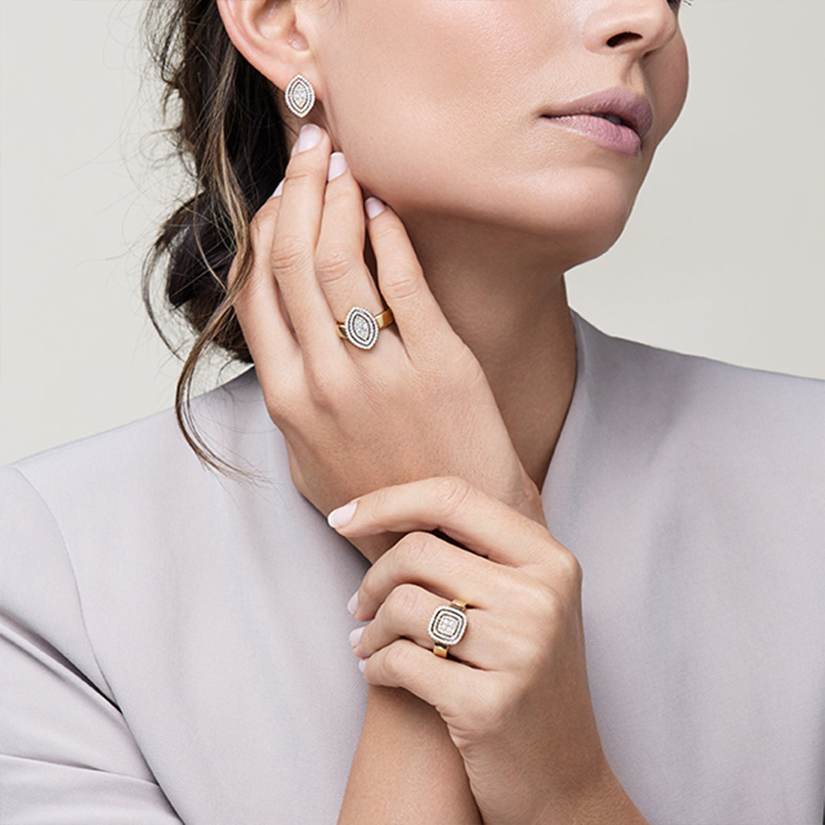 Shimansky model wearing the Starlight collection rings and earrings